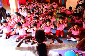 Jaffna-Primary-school-Yoga-class-listening-to-the-Om (click image to enlarge)