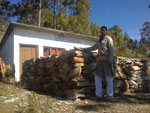 Himalayan village of Budhna 2015 - School principal with stone materials and existing school